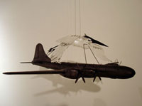 Blown glass bird and plane
