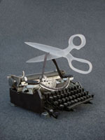 typewriter w/ scissors